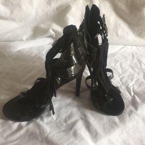 Black fringe heels